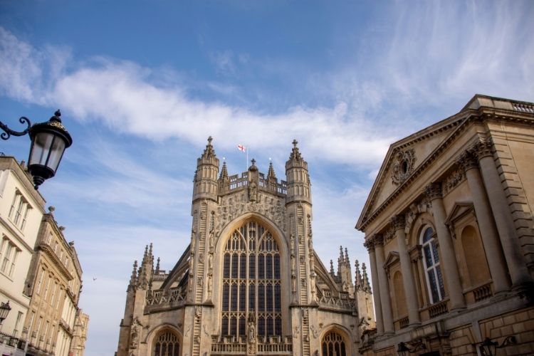 An image of Bath abbey with blue skies and slight cloud. The Most Romantic UK Destinations To Go In Your Motorhome by Webbs