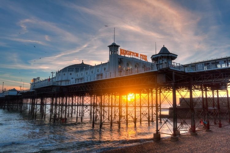 Sunset behind Brighton Pier. The Most Romantic UK Destinations To Go In Your Motorhome by Webbs