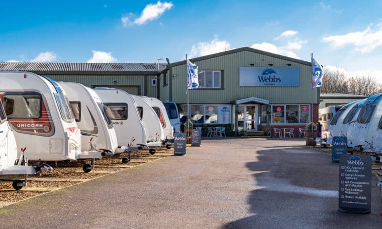 Webbs Caravans branch in Salisbury from the forecourt with used-caravans for sale.