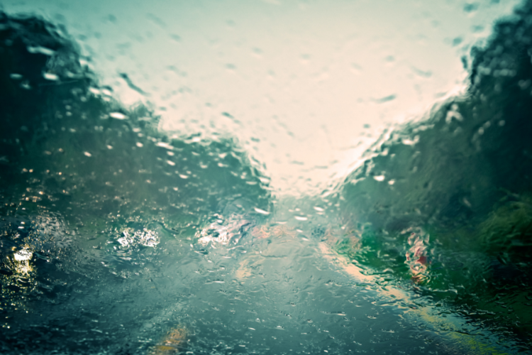 Rainy view through a vehicle windscreen