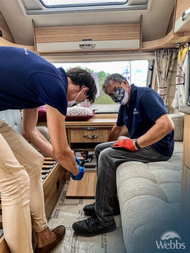 Technicians at Webbs in Salisbury finalising the interior of the caravan before customer collection.