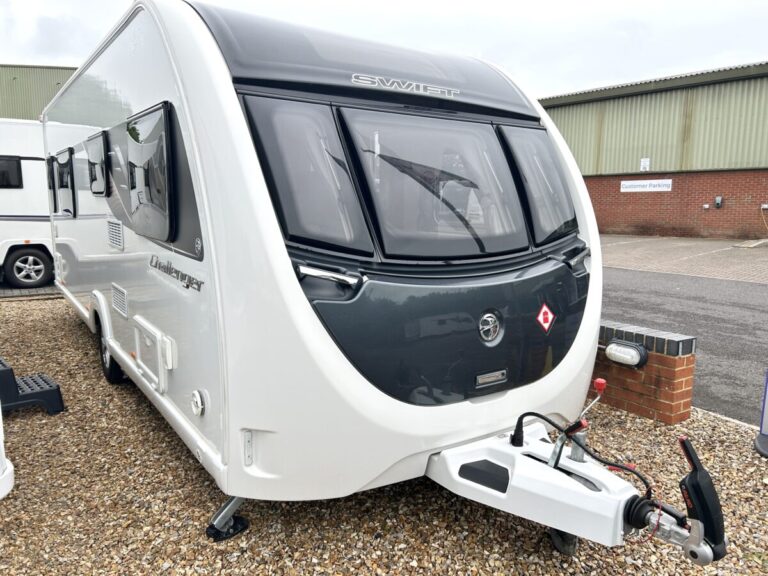 White Swift Challenger caravan front shot on gravel