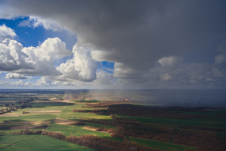 A view of fields and hedges, with grey cloud covering half of the scenery. A Webbs blog on ensuring safety and security in your motorhome or caravan adventure.