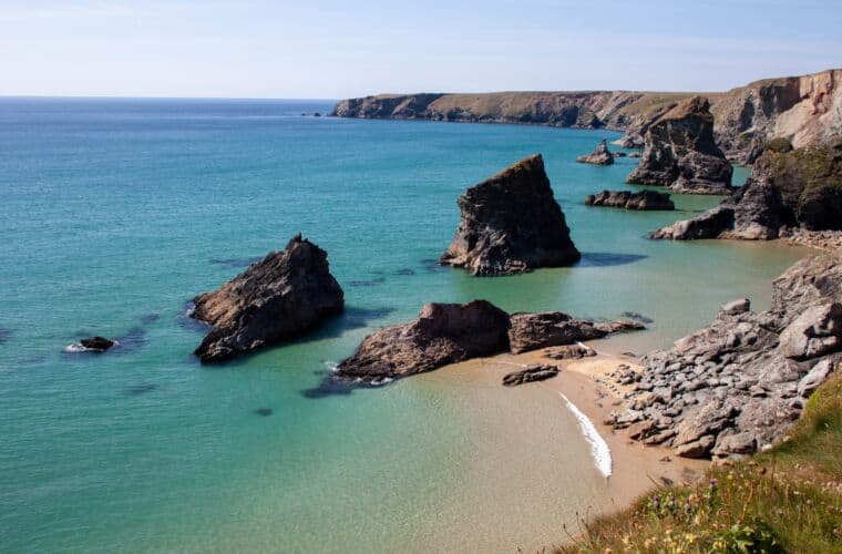 A Cornish beach in summer time. Top 5 Motorhome-friendly UK holiday destinations