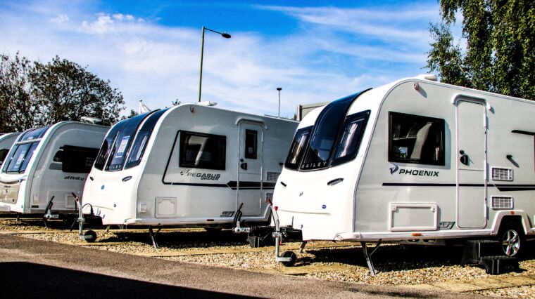 Both a Phoenix and Pegasus caravan parked in the Webbs Showroom